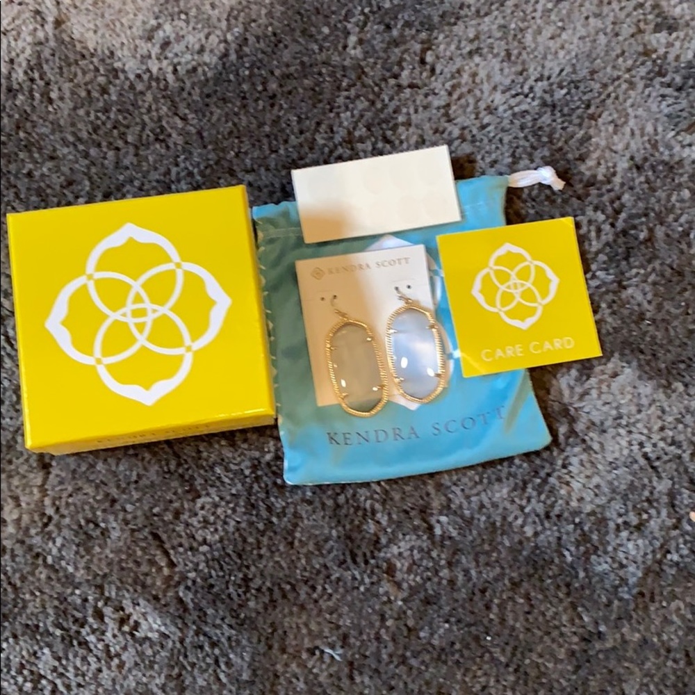 Kendra Scott earrings.